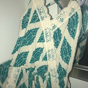 Super cute romper size XS fits like a small